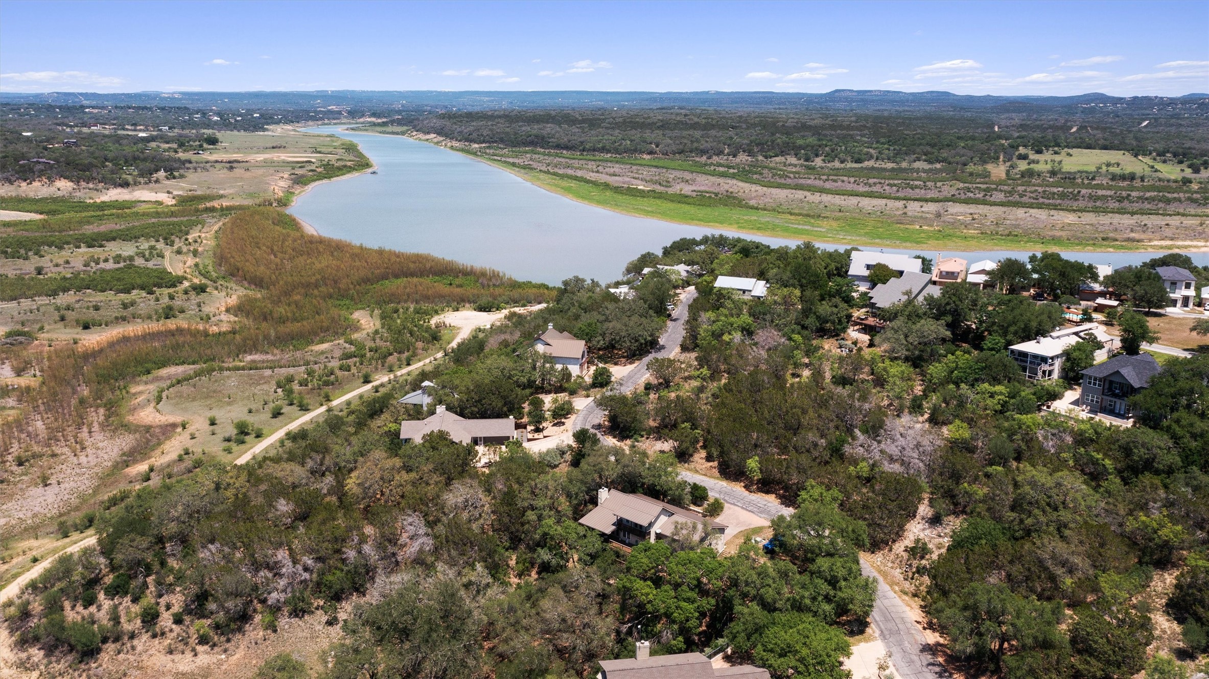 1017 Coventry Road Spicewood, TX 78669 - Photo 42 of 43 a view of a city with an ocean view