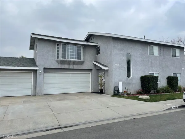 a front view of a house with a garage