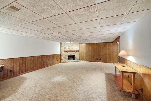 a view of kitchen and a fireplace