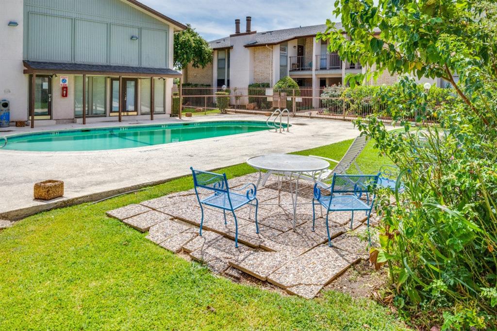12830 Midway Road, Unit 1120 Dallas, TX 75244 - Photo 12 of 14 a view of outdoor space yard deck and patio