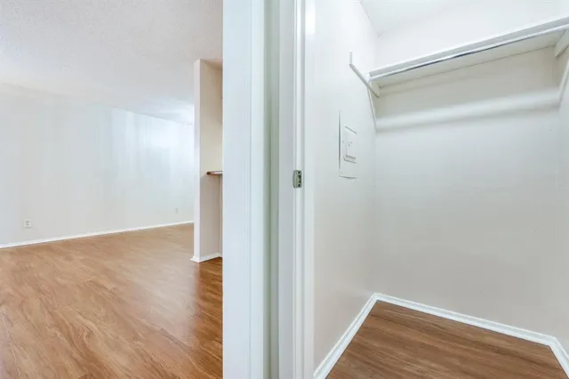 a kitchen with a sink and a refrigerator