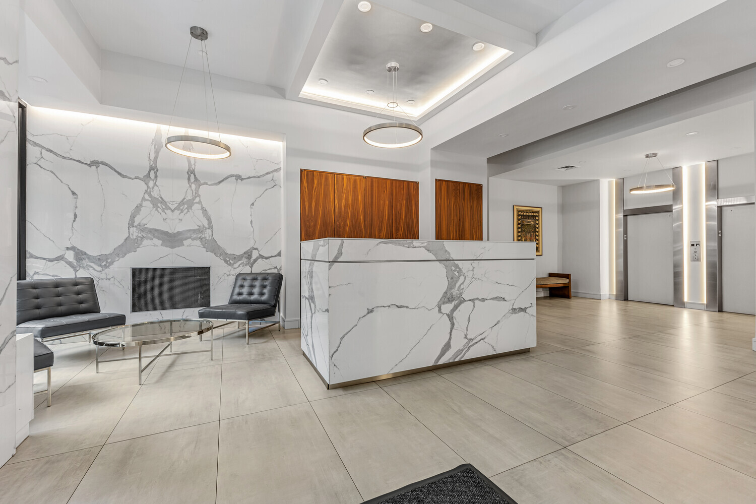 207 East 74th Street, Unit PHG Manhattan, NY 10021 - Photo 10 of 12 a view of a livingroom with furniture and a fireplace