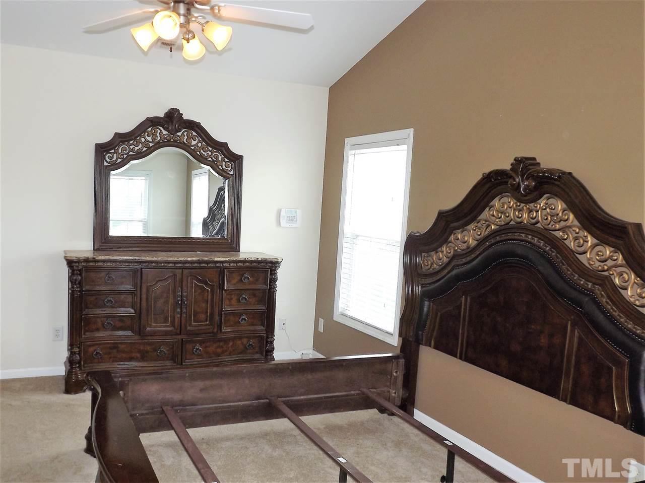 7032 Spanglers Spring Way Raleigh, NC 27610 - Photo 14 of 25 a view of a entryway with a fireplace