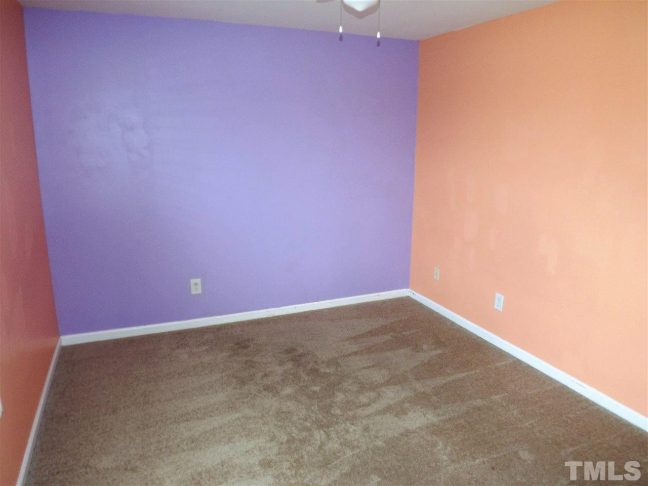 7032 Spanglers Spring Way Raleigh, NC 27610 - Photo 16 of 25 a view of an empty room