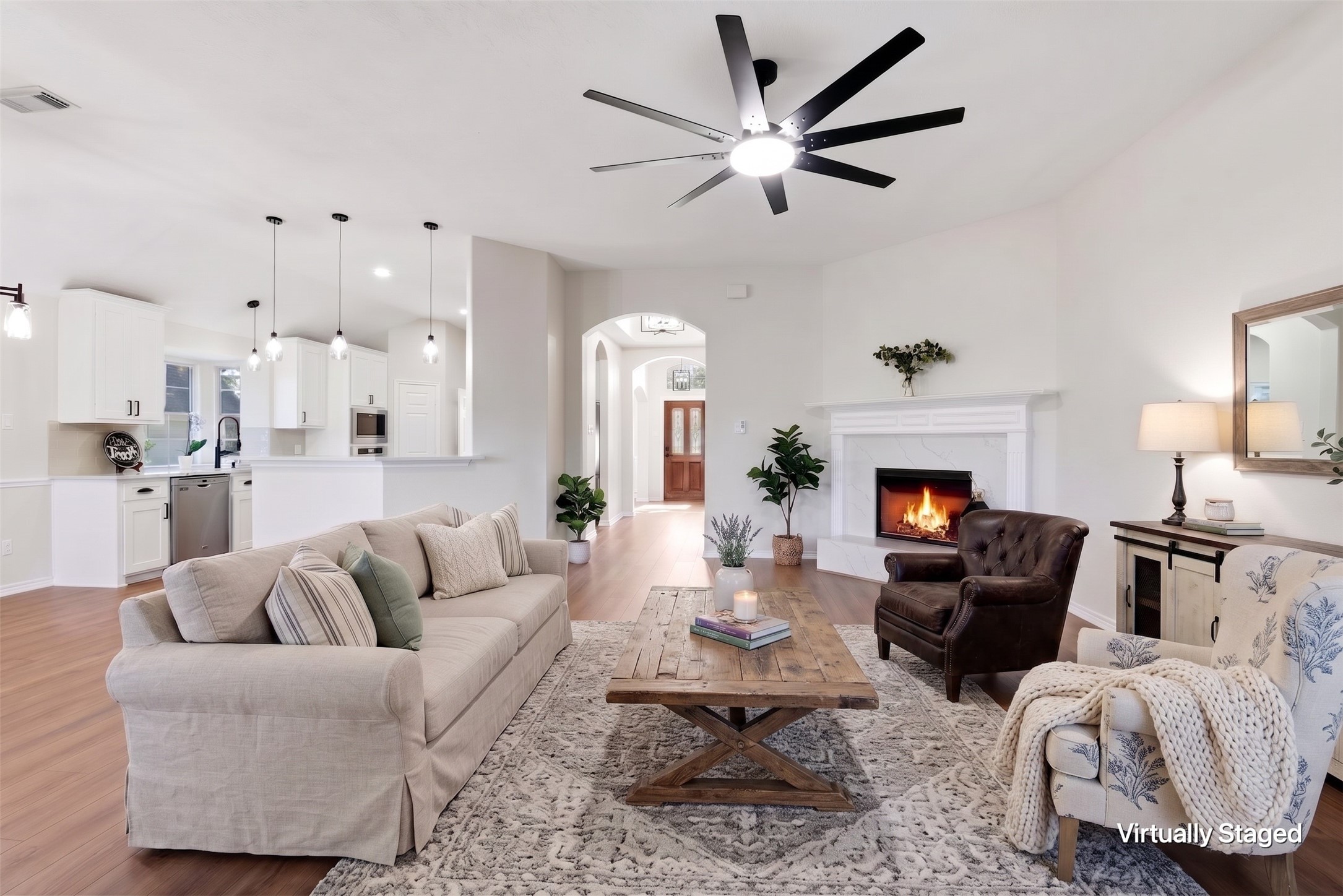 29819 South Legends Village Circle Spring, TX 77386 - Photo 10 of 48 a living room with furniture and a fireplace