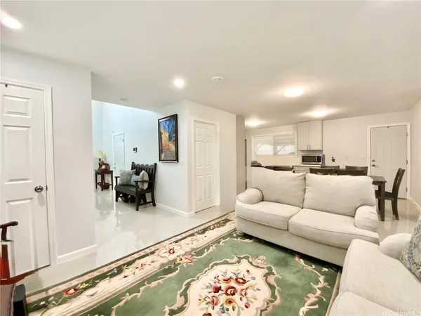 a living room with furniture and a couch