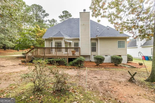 a backyard of a house with seating space