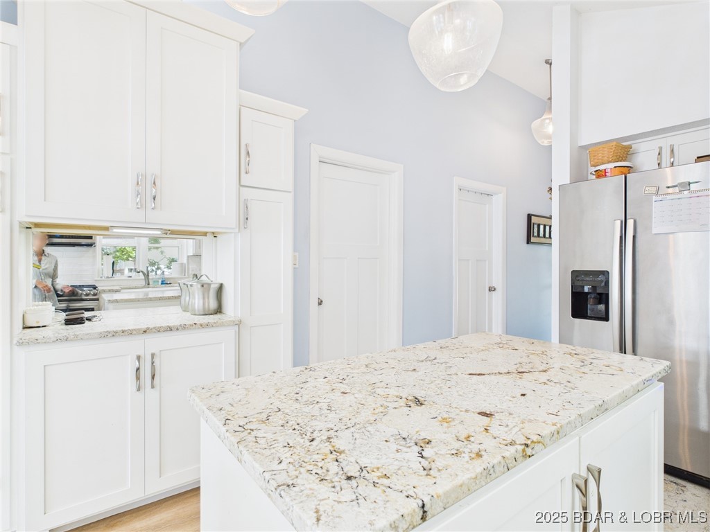 30089 Gresham Road Gravois Mills, MO 65037 - Photo 12 of 52 Central island ideal for meal preparation and addi