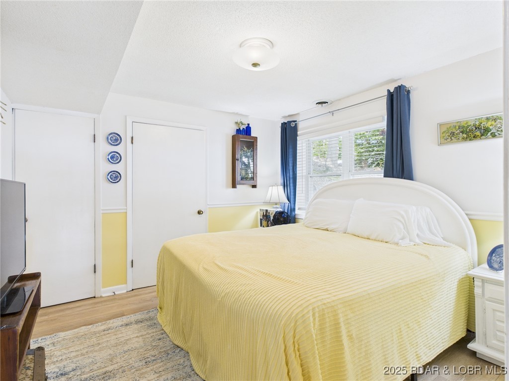 30089 Gresham Road Gravois Mills, MO 65037 - Photo 24 of 52 Bright and airy bedroom filled with natural light.