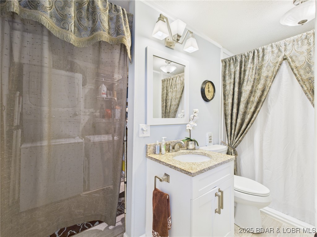 30089 Gresham Road Gravois Mills, MO 65037 - Photo 31 of 52 A bright bathroom with modern fixtures.