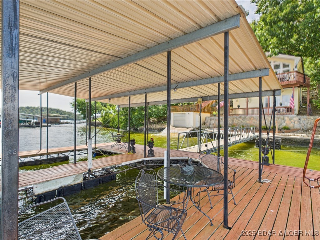 30089 Gresham Road Gravois Mills, MO 65037 - Photo 46 of 52 Rear view of the home in the Summer.