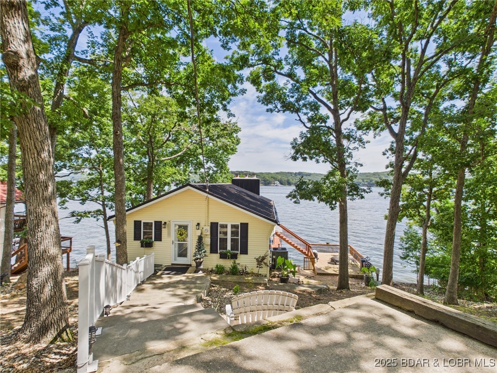 30089 Gresham Road Gravois Mills, MO 65037 - Photo 49 of 52 Front view of home in the Summer.
