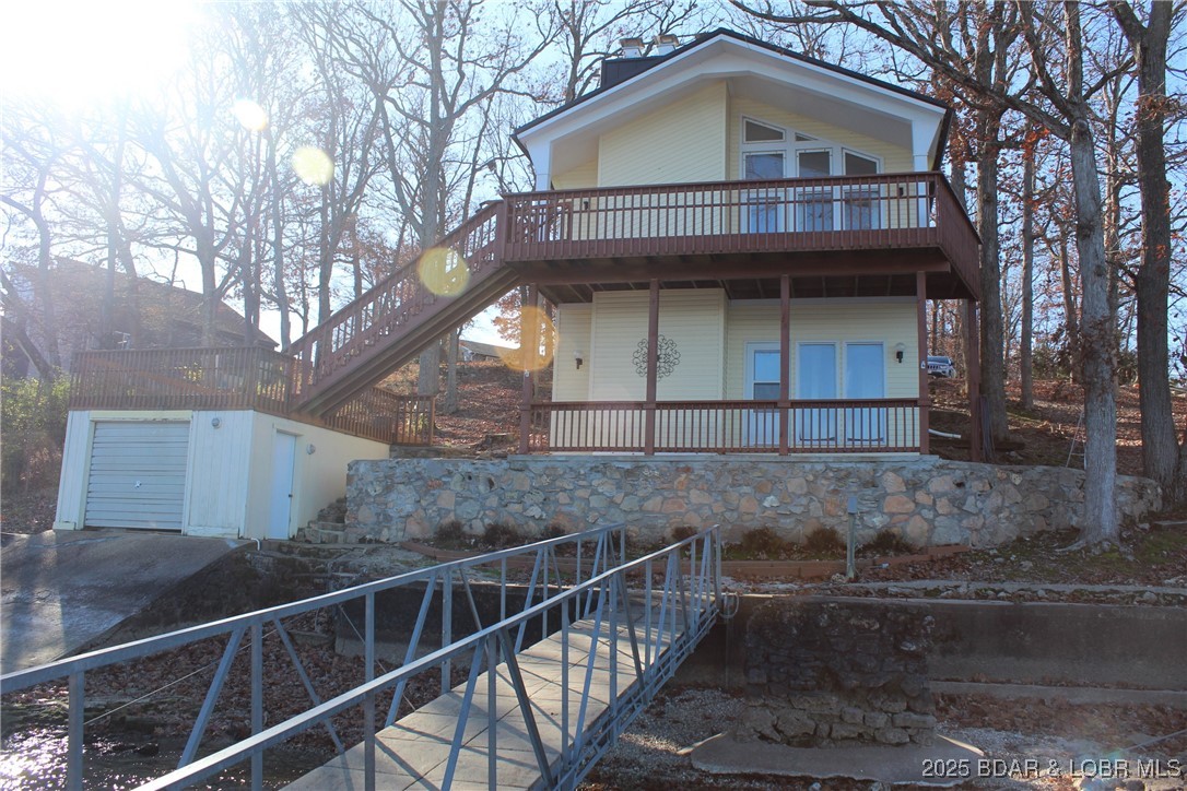 30089 Gresham Road Gravois Mills, MO 65037 - Photo 5 of 52 Rear view of home in the Fall.