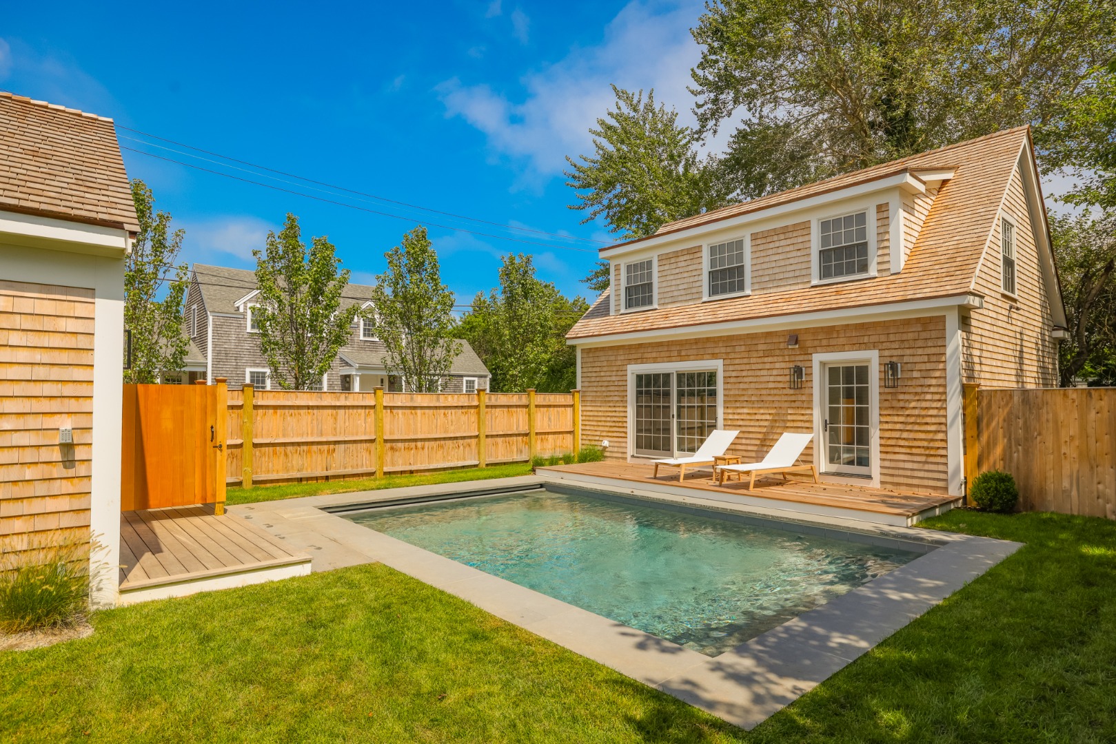 12 Derrymore Road Nantucket, MA 02554 - Photo 8 of 35 a view of a house with pool and sitting area