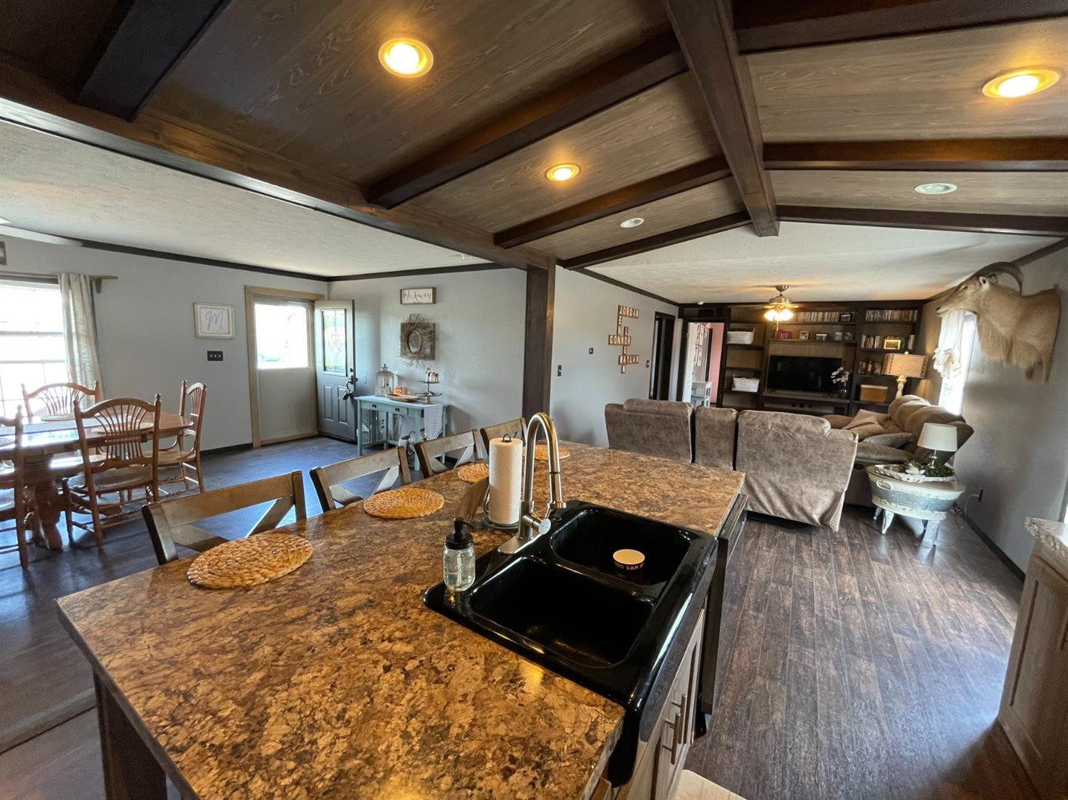 403 Geisler Quitaque, TX 79255 - Photo 14 of 26 a living room with lots of furniture and kitchen view