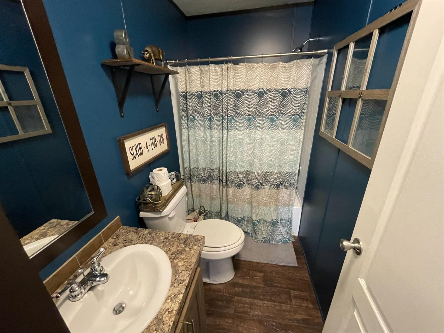 403 Geisler Quitaque, TX 79255 - Photo 24 of 26 a bathroom with a sink toilet and shower