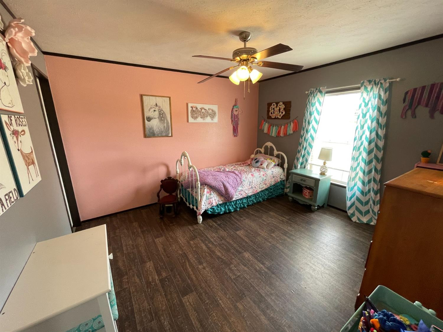403 Geisler Quitaque, TX 79255 - Photo 25 of 26 a bed room with furniture and a window