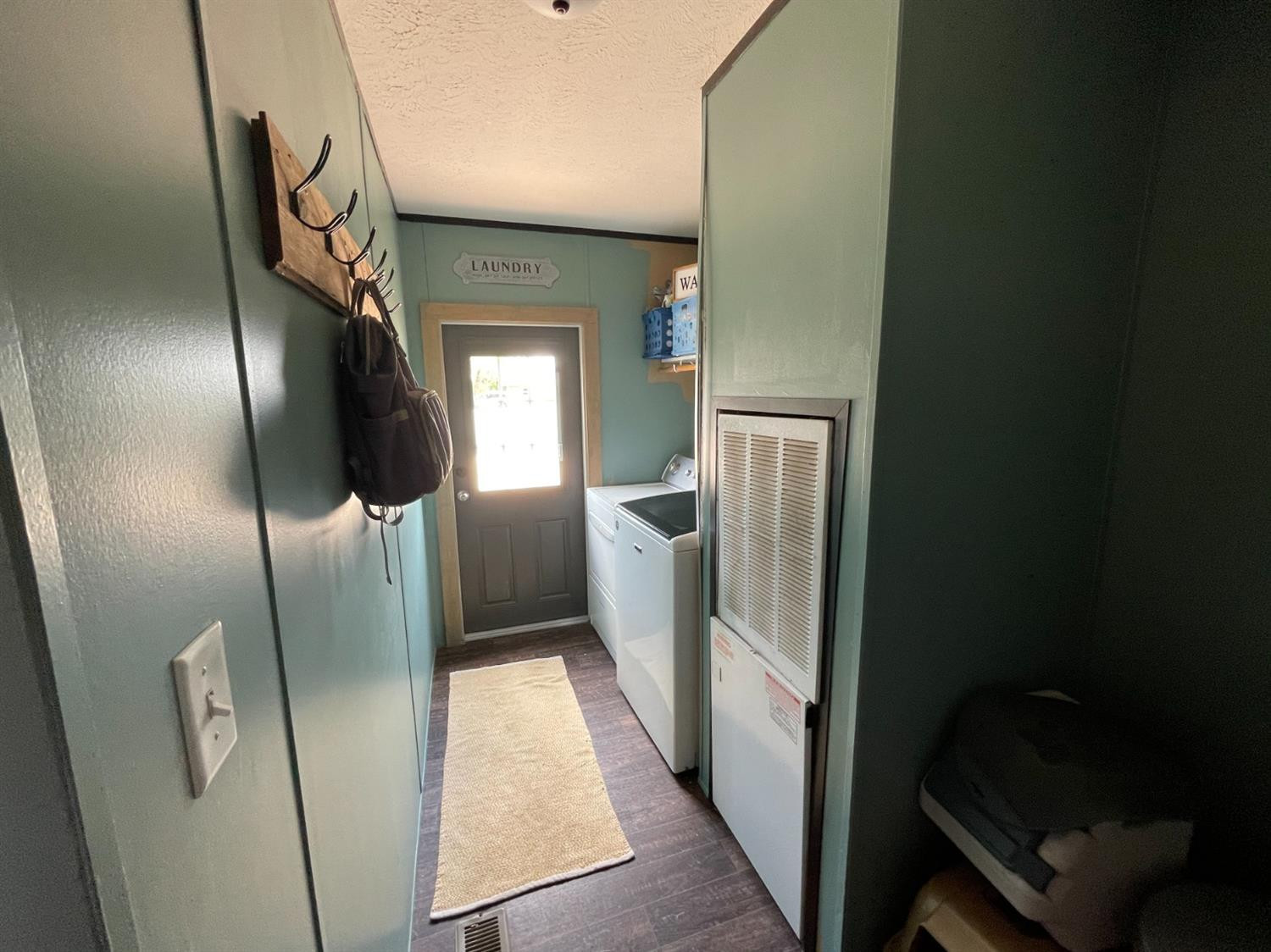 403 Geisler Quitaque, TX 79255 - Photo 26 of 26 a view of a hallway with wooden floor
