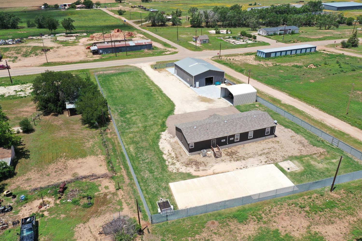 403 Geisler Quitaque, TX 79255 - Photo 3 of 26 a view of a lake with a house