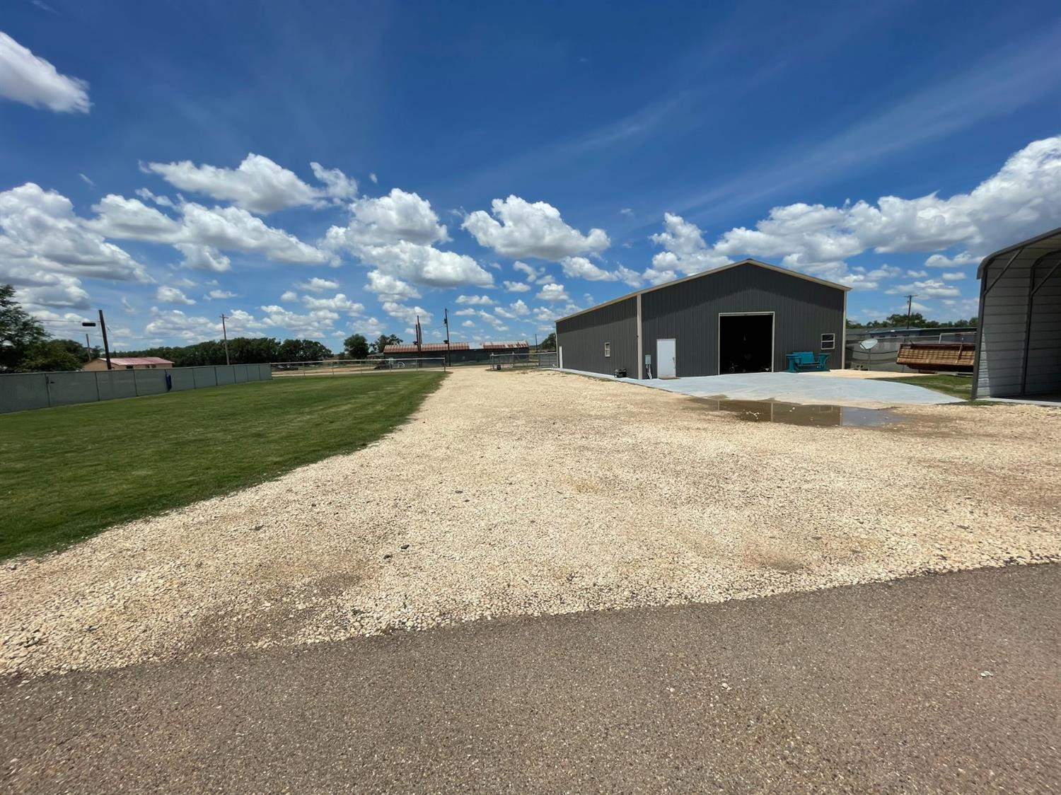 403 Geisler Quitaque, TX 79255 - Photo 6 of 26 a front view of a house with a yard and garage