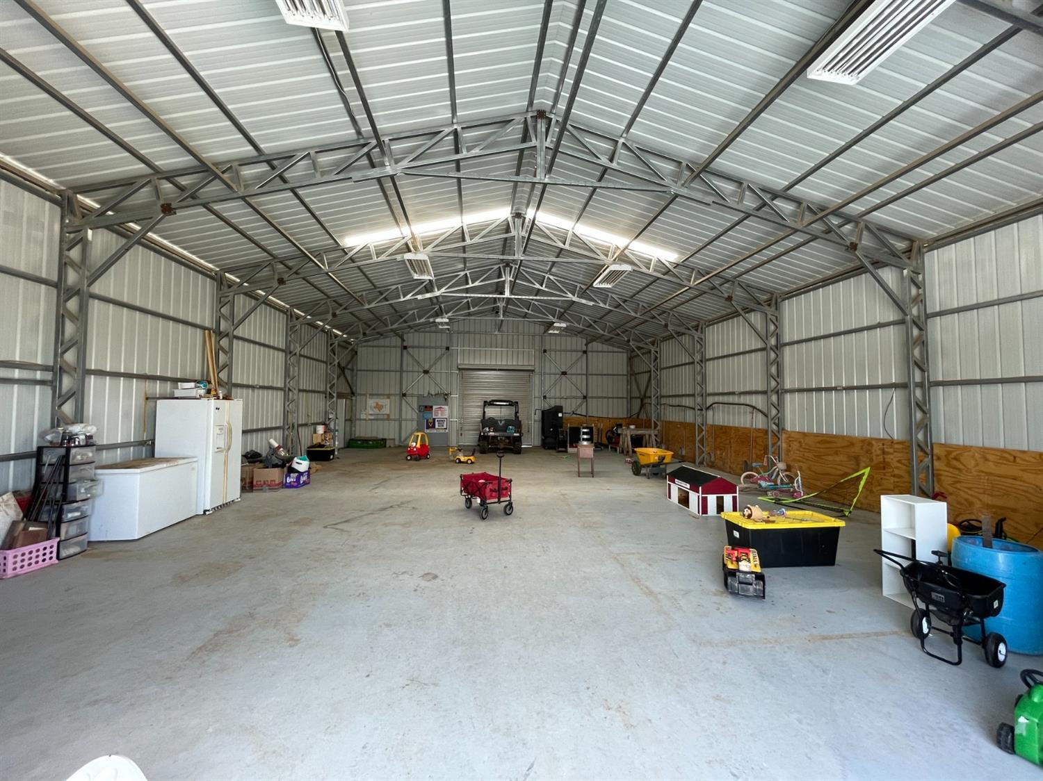 403 Geisler Quitaque, TX 79255 - Photo 9 of 26 a view of parking garage with cars