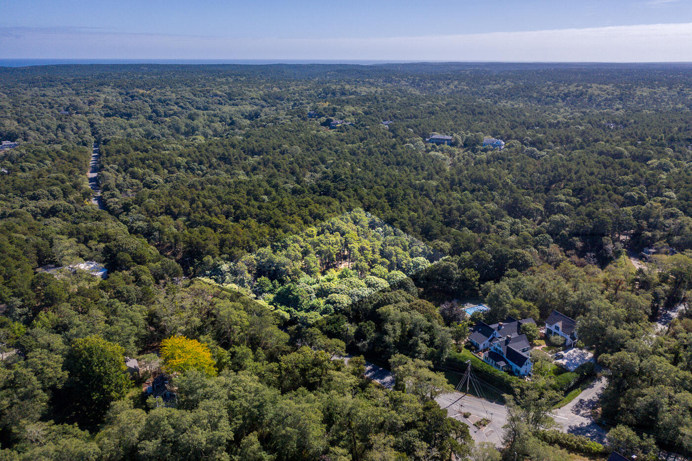 32 Depot Road Truro, MA 02666 - Photo 3 of 9 an aerial view of residential houses with outdoor space and trees