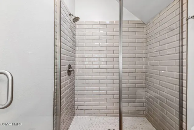 a view of a balcony with a pot