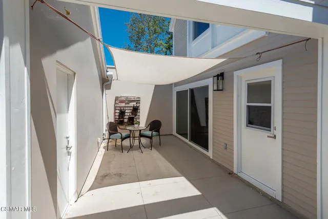 a view of dining room with furniture and entryway