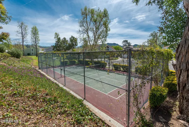a view of a street with houses