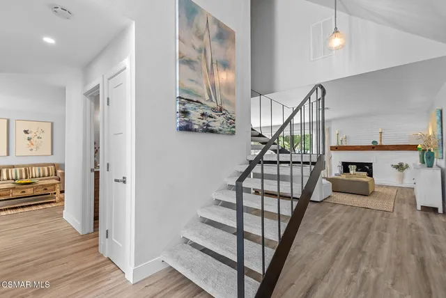 a view of entryway with wooden floor