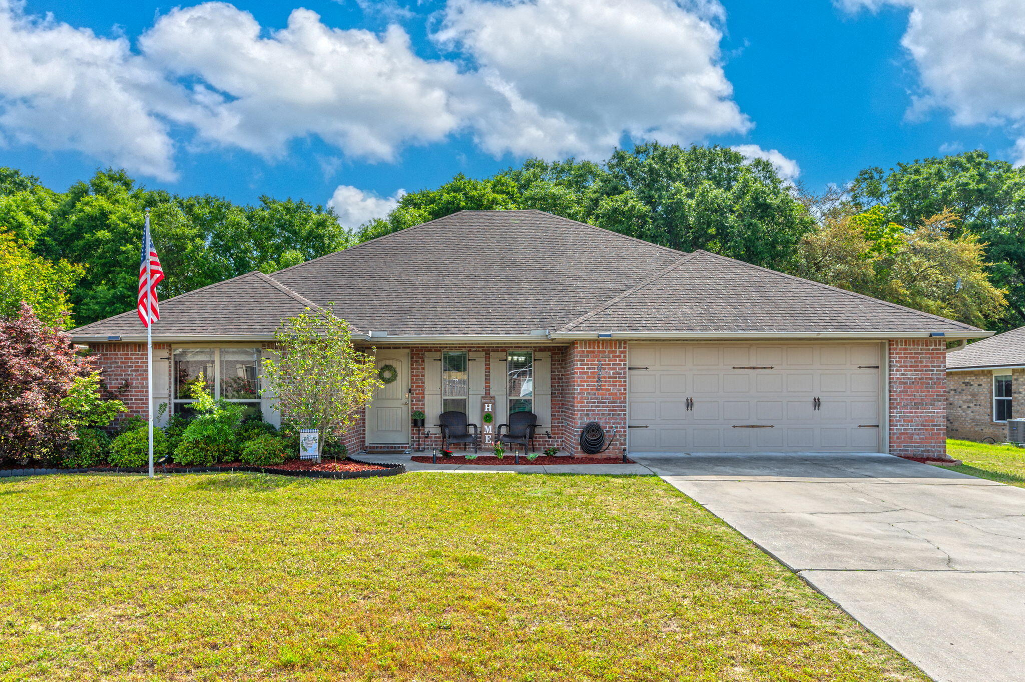 5280 Moore Loop Crestview, FL 32536 - Photo 1 of 54 a view of a house with pool and yard