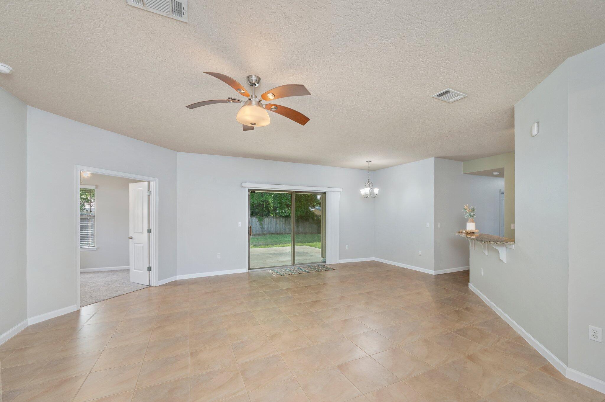 5280 Moore Loop Crestview, FL 32536 - Photo 14 of 54 a view of an empty room with a window