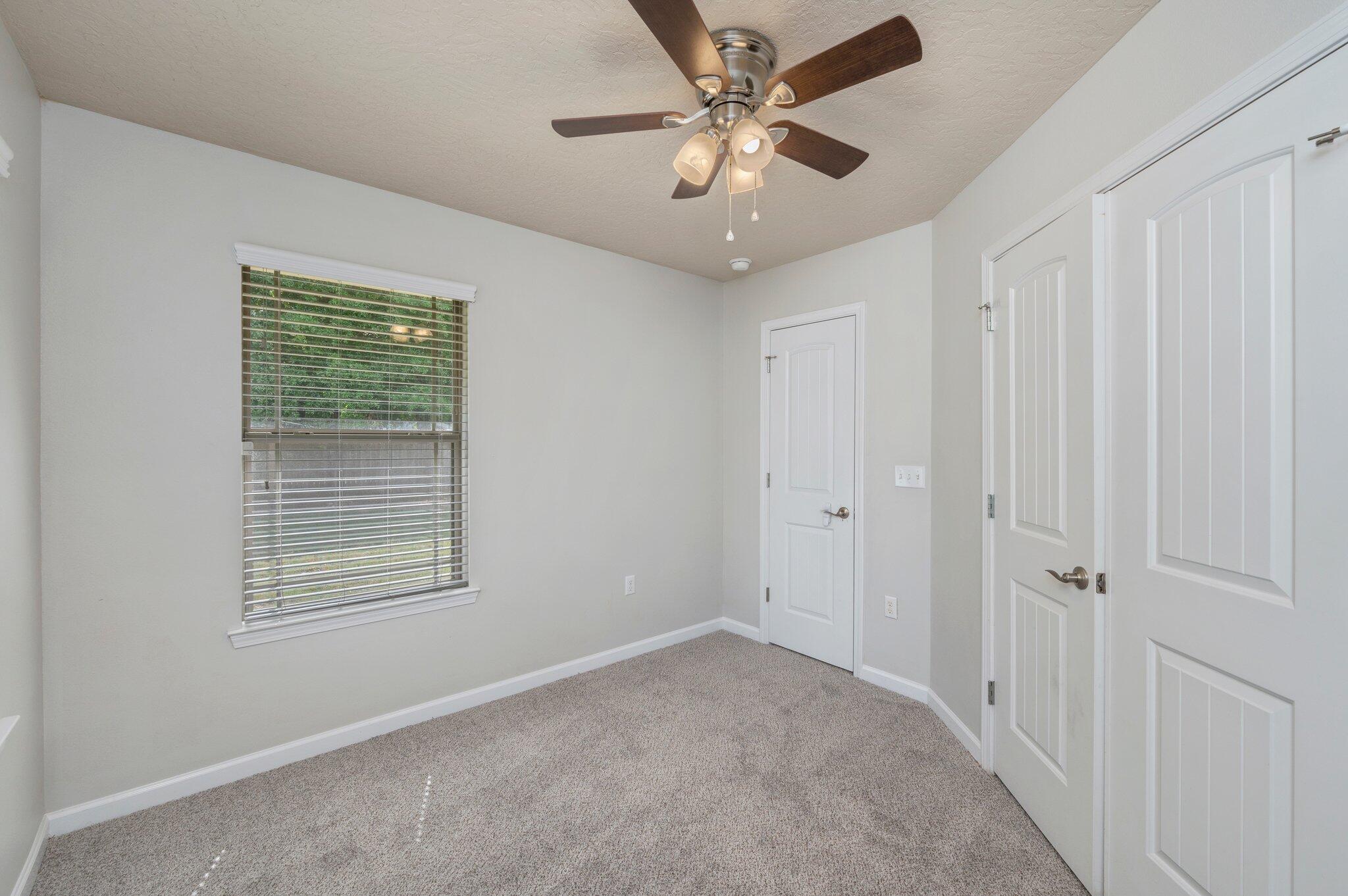 5280 Moore Loop Crestview, FL 32536 - Photo 23 of 54 a view of an empty room with a window