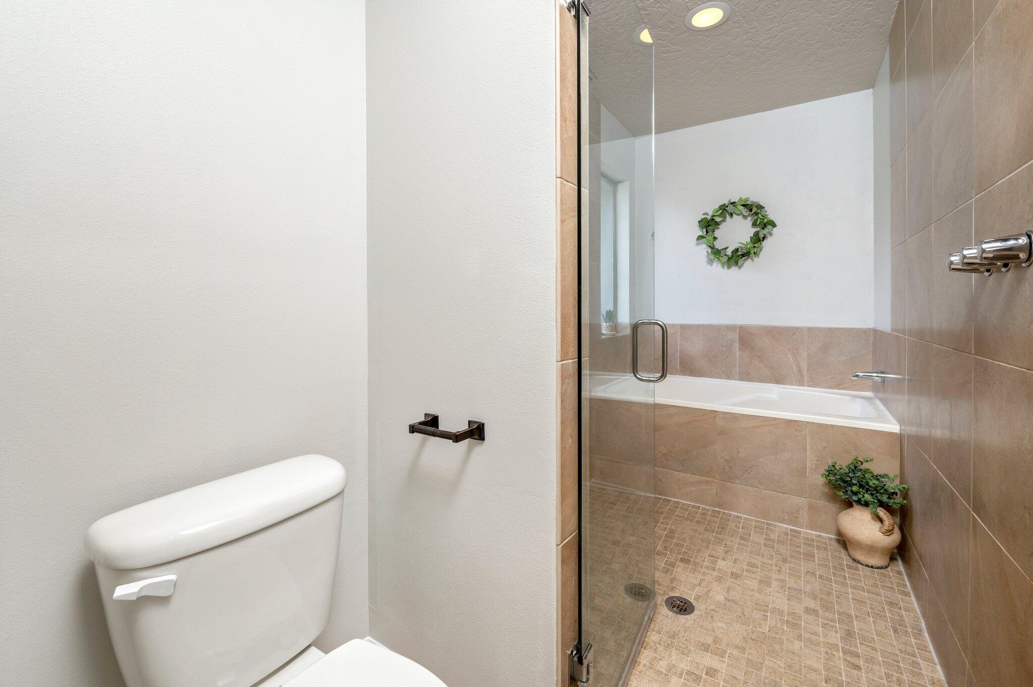 5280 Moore Loop Crestview, FL 32536 - Photo 31 of 54 a bathroom with a toilet and a potted plant