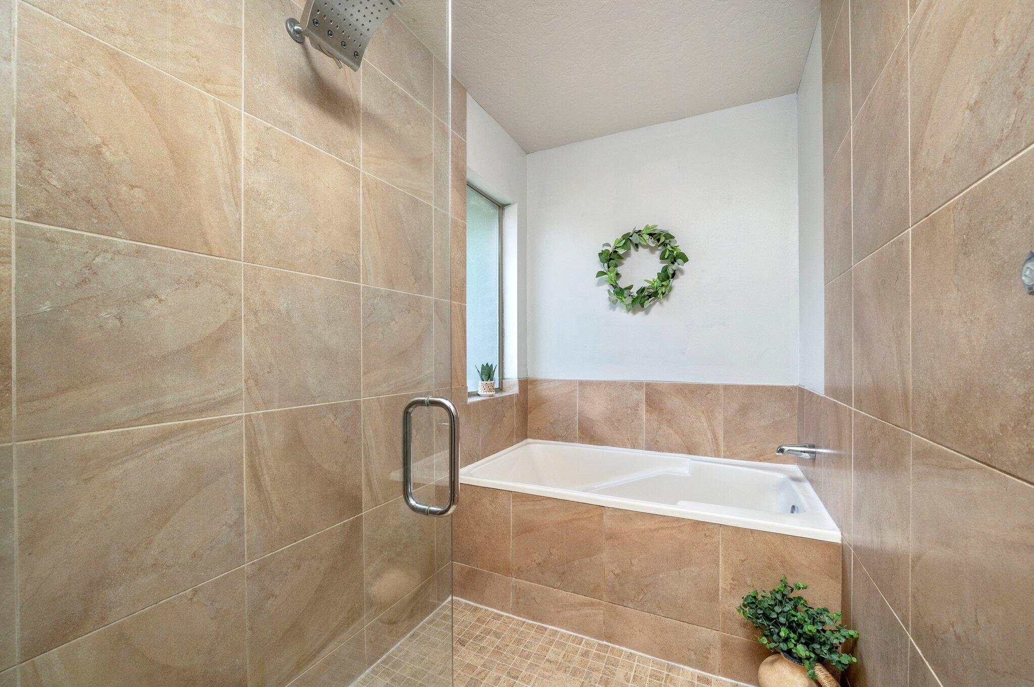5280 Moore Loop Crestview, FL 32536 - Photo 32 of 54 a white bath tub sitting next to a white shower