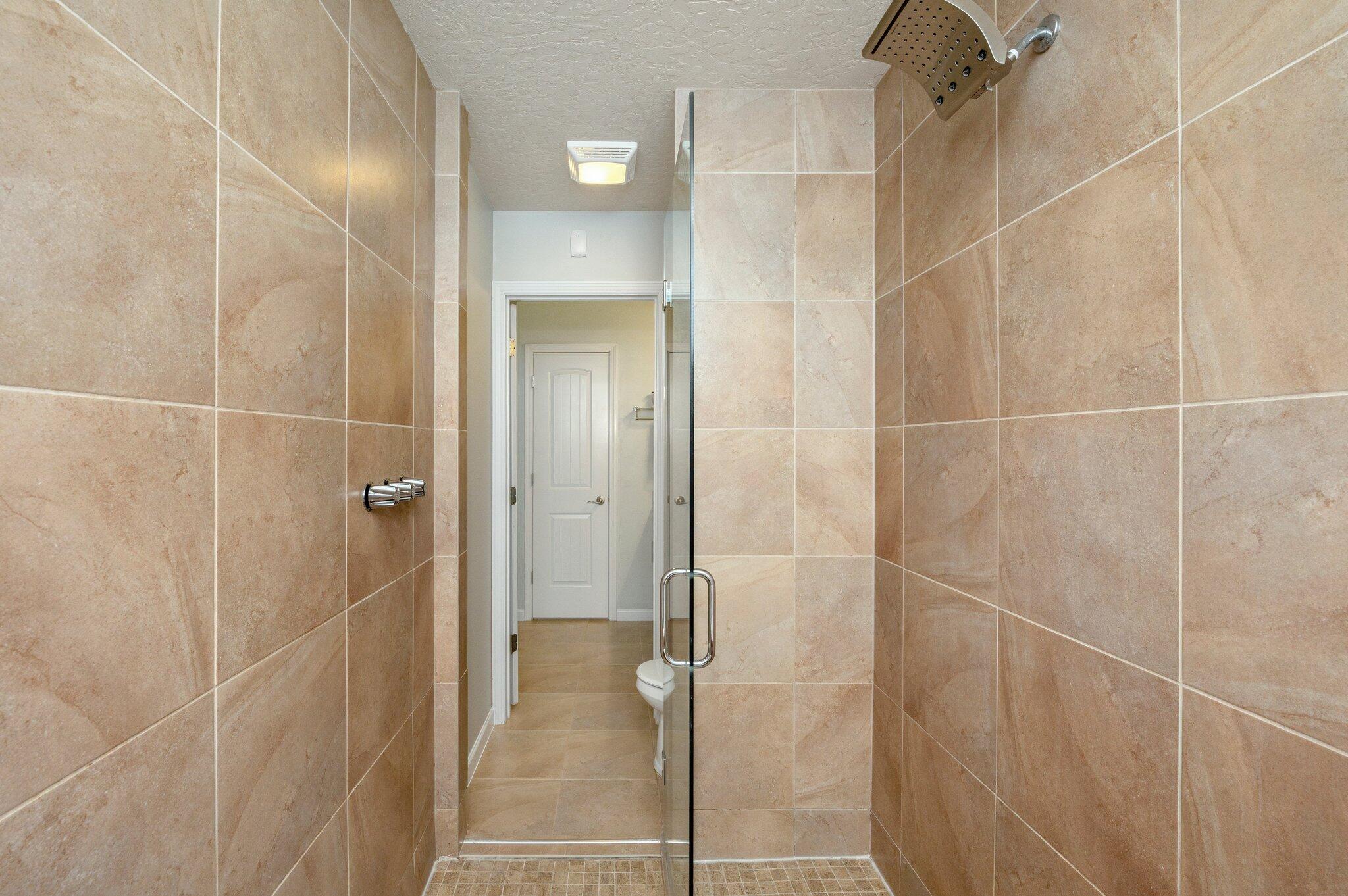 5280 Moore Loop Crestview, FL 32536 - Photo 36 of 54 a bathroom with a shower