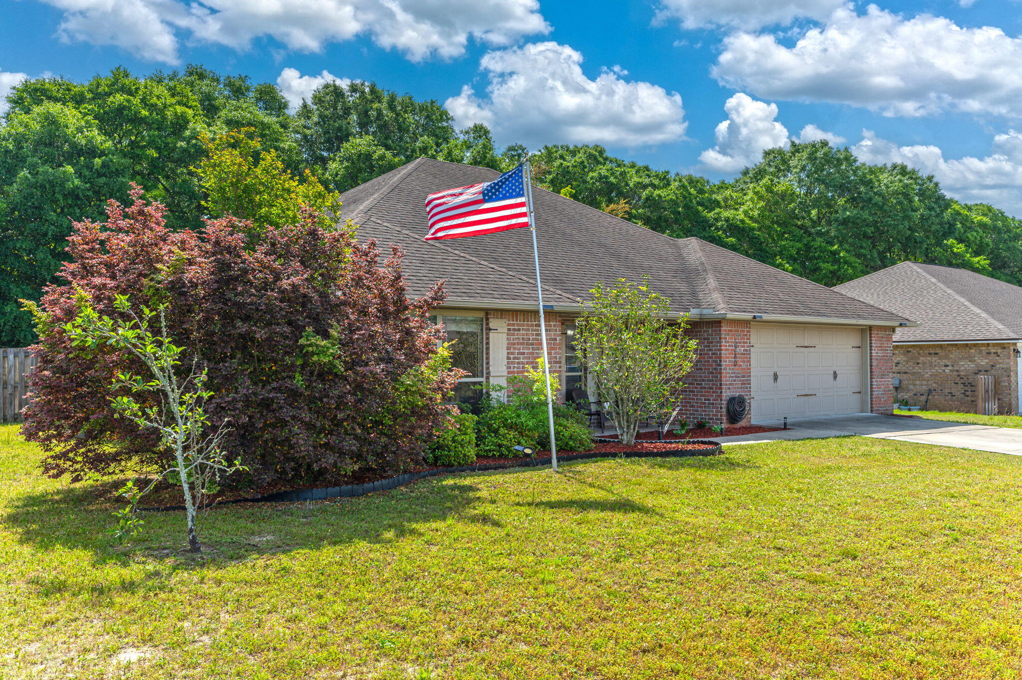 5280 Moore Loop Crestview, FL 32536 - Photo 4 of 54 a house view with a outdoor space