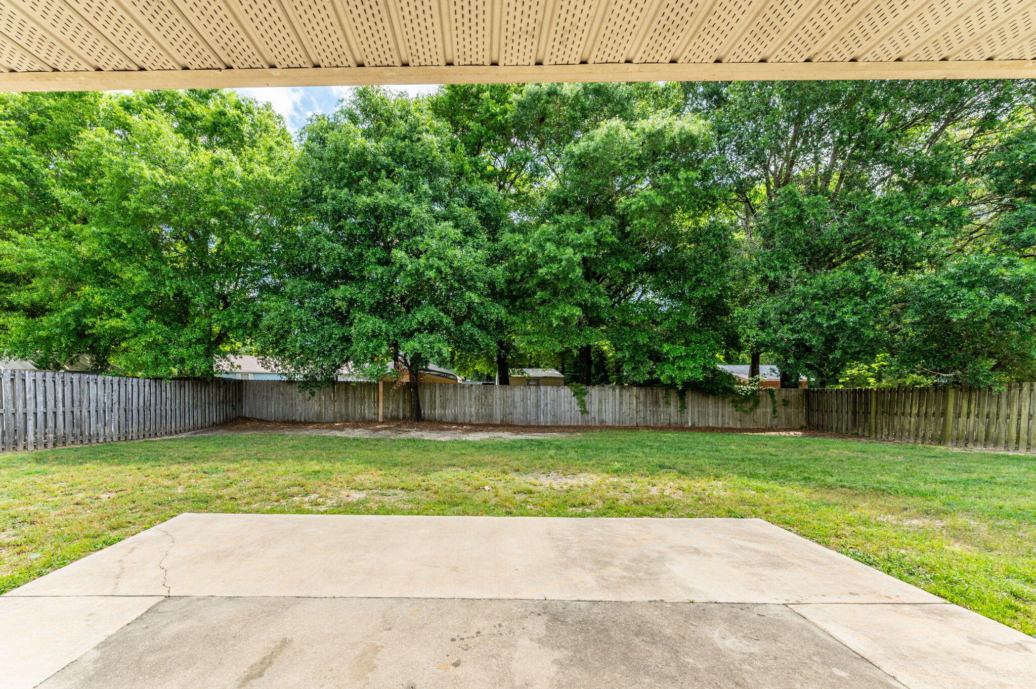 5280 Moore Loop Crestview, FL 32536 - Photo 50 of 54 a view of a swimming pool with a yard