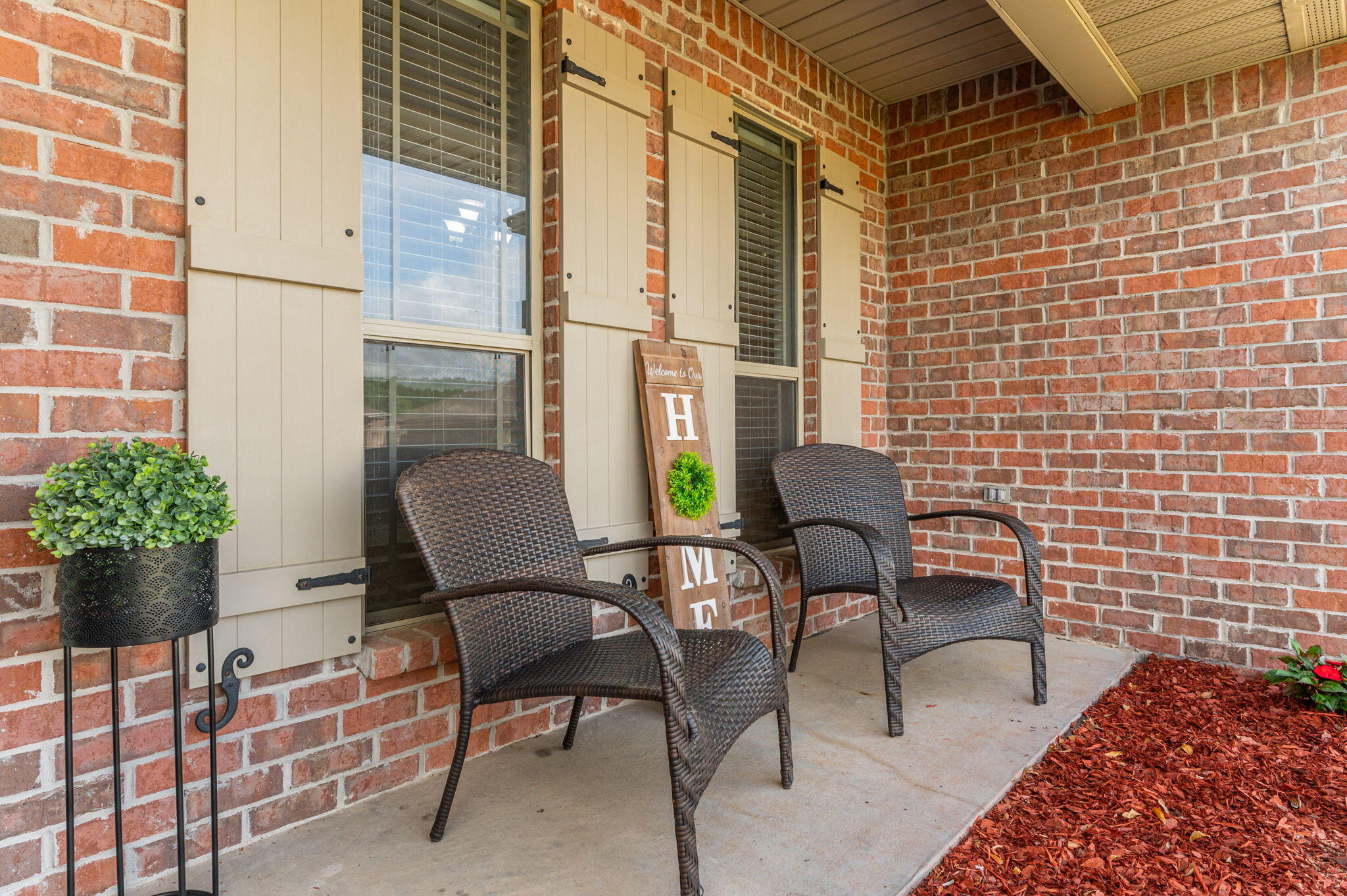 5280 Moore Loop Crestview, FL 32536 - Photo 7 of 54 a couple of chairs sitting in front of a door