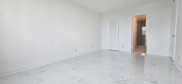 an empty room with a natural light