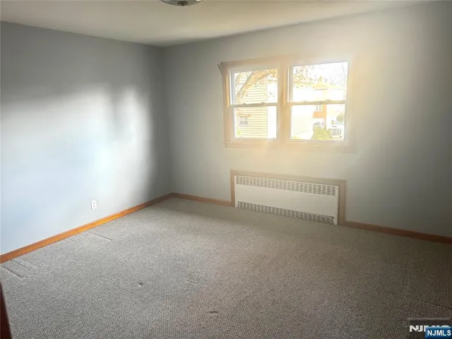 a bathroom with a bathtub and sink