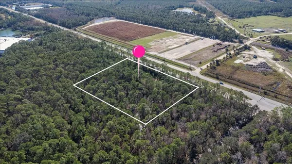 an aerial view of a backyard