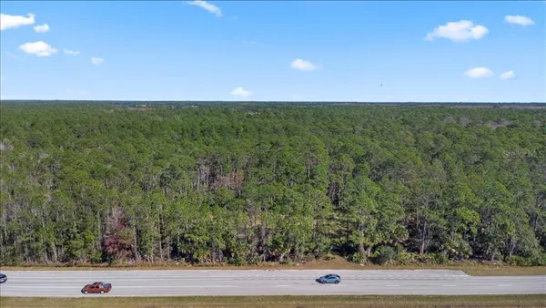 a view of a yard with an outdoor space