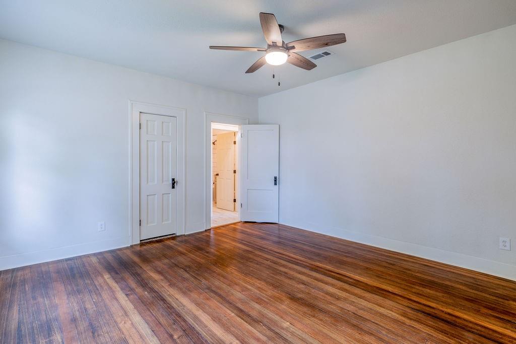 711 Fannin Street Nocona, TX 76255 - Photo 22 of 35 a view of room with window and ceiling fan
