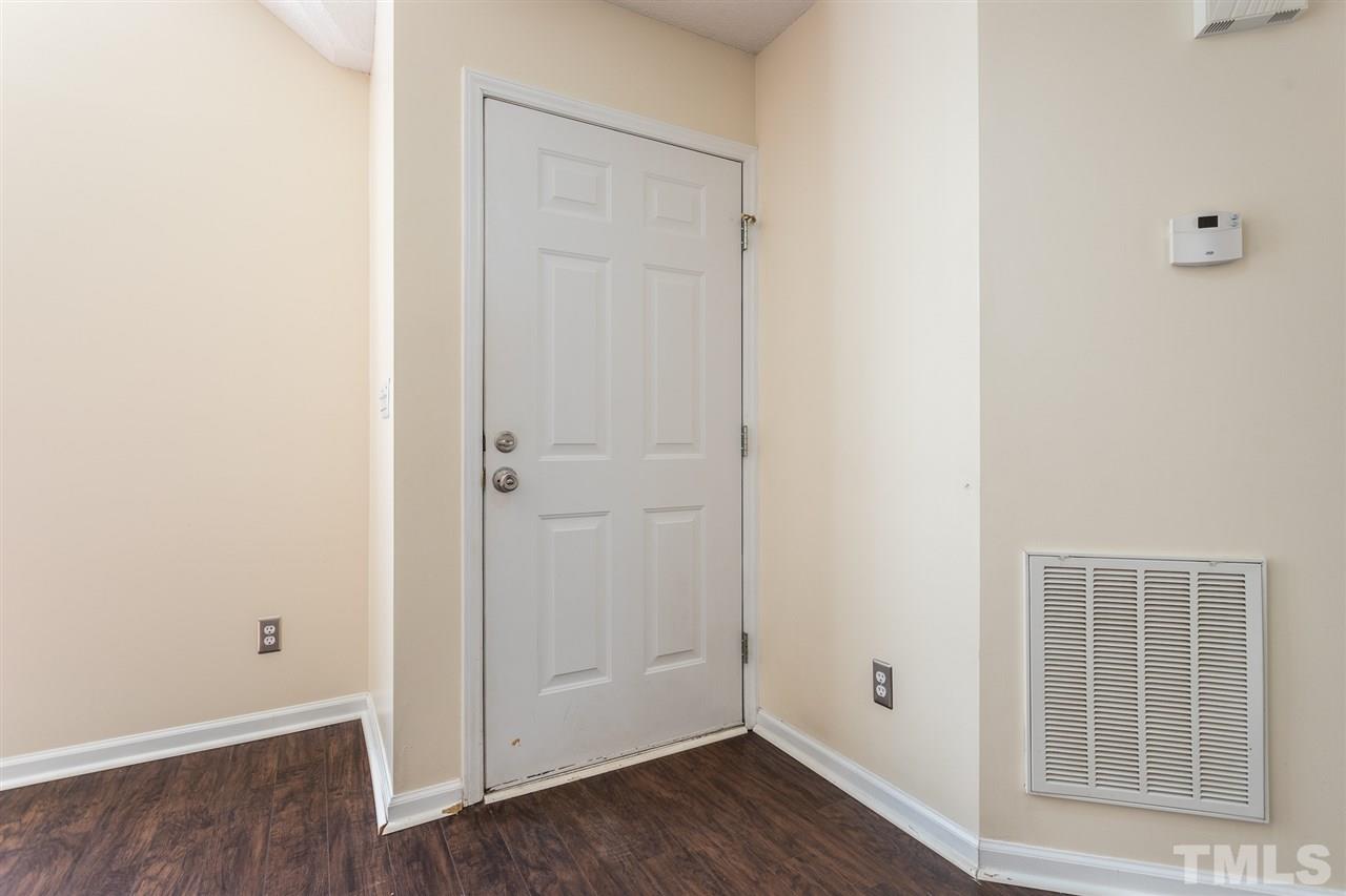 2100 Havering Place Raleigh, NC 27604 - Photo 2 of 27 a view of an empty room with wooden floor and closet