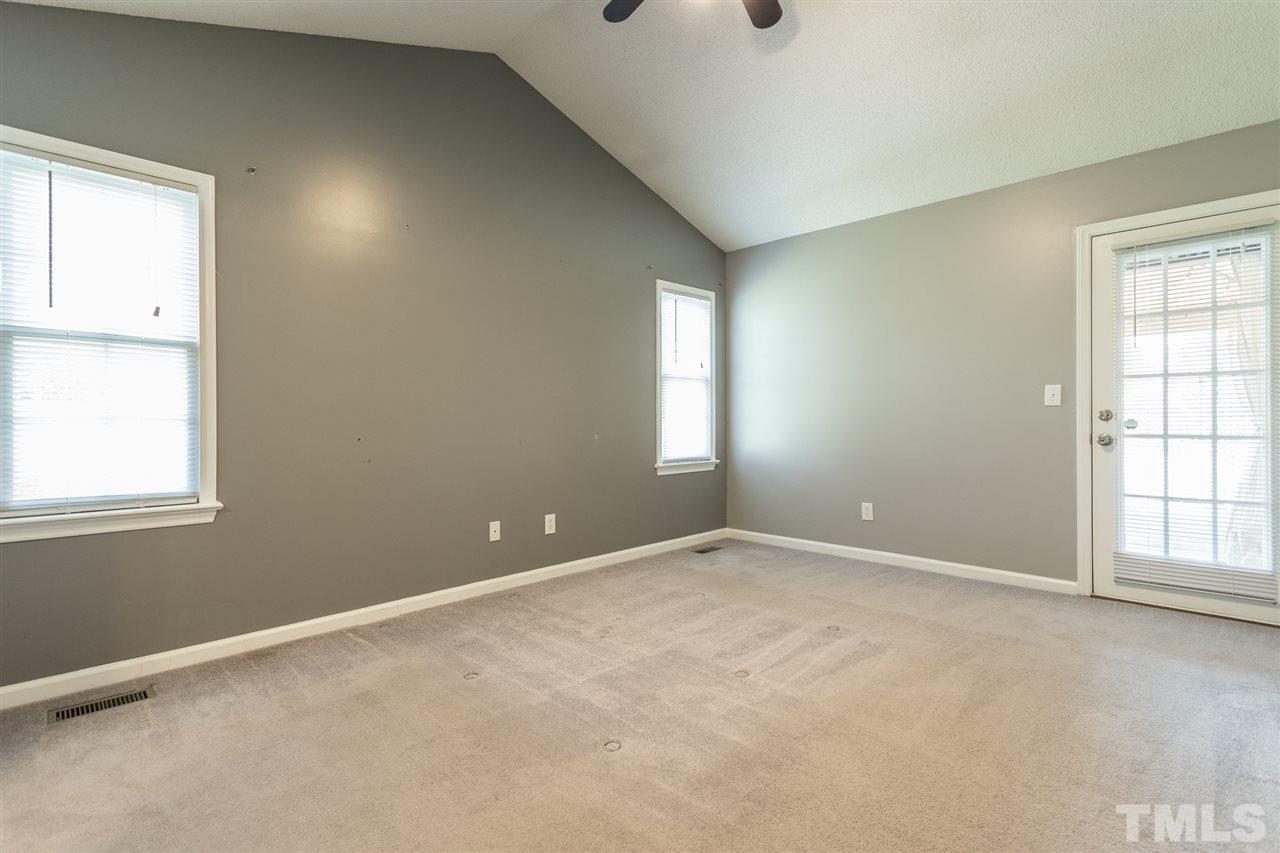 2100 Havering Place Raleigh, NC 27604 - Photo 20 of 27 an empty room with windows