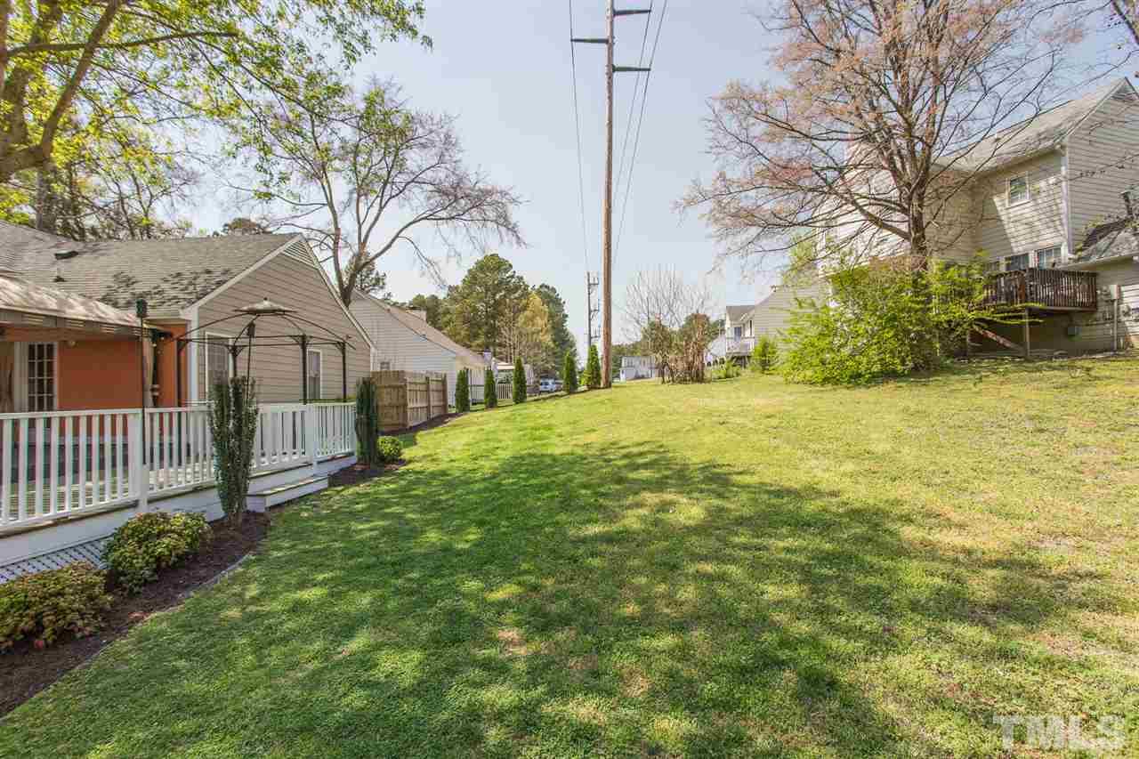 2100 Havering Place Raleigh, NC 27604 - Photo 23 of 27 a view of a house with a yard and pathway