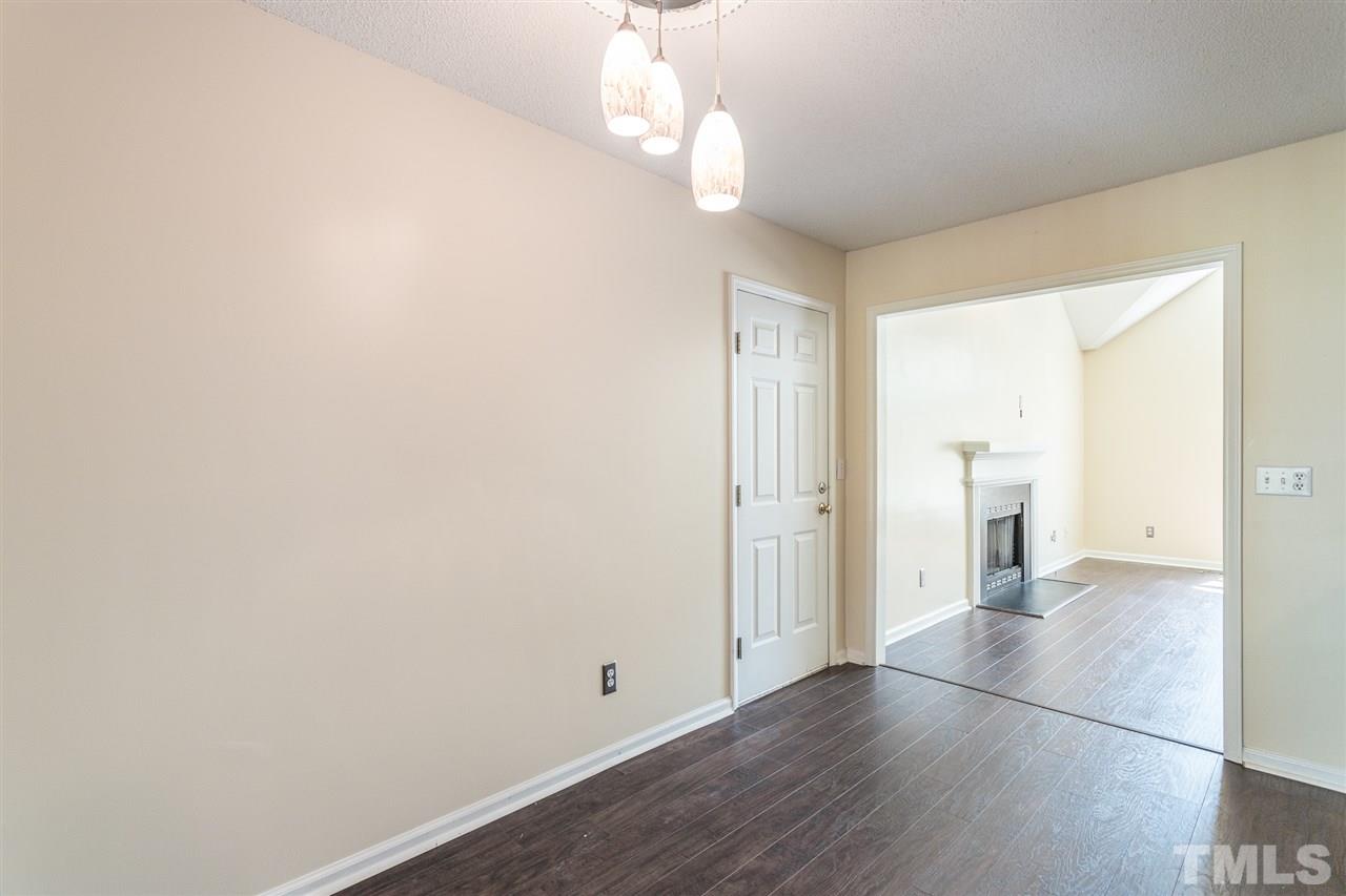 2100 Havering Place Raleigh, NC 27604 - Photo 8 of 27 a view of a livingroom with wooden floor
