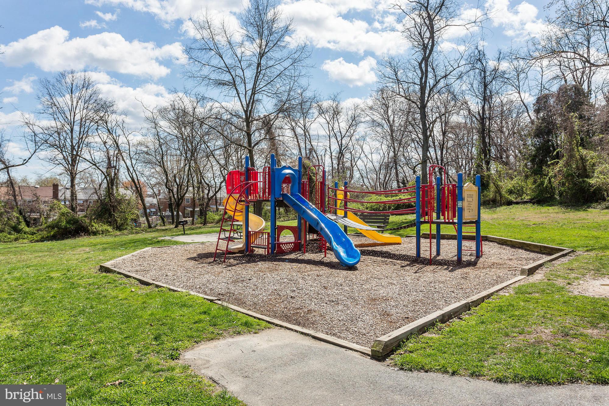 4433 Walnut Road Baltimore, MD 21227 - Photo 22 of 25 a view of a park with swings
