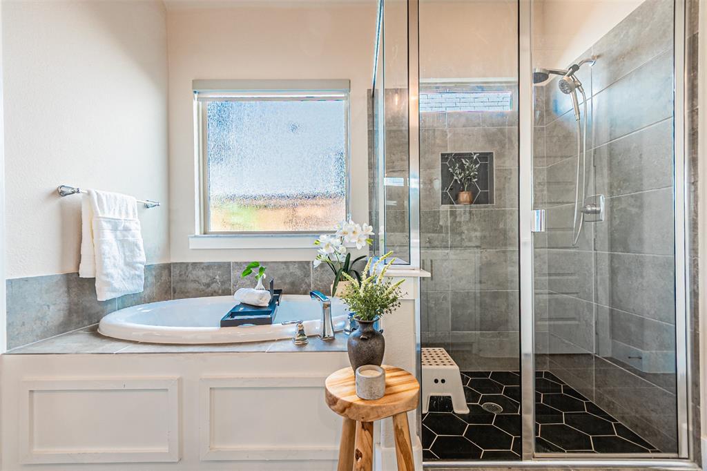 1070 Adair Road Prosper, TX 75078 - Photo 19 of 40 Soaking tub with tiled surround and wainscoting base